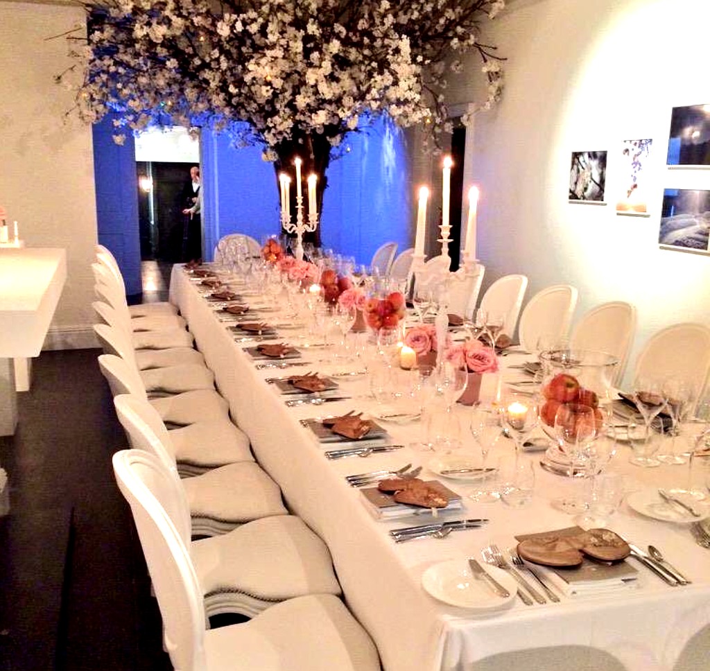 Private dining setup at 15 Bateman Street with candlelit table and floral centrepiece