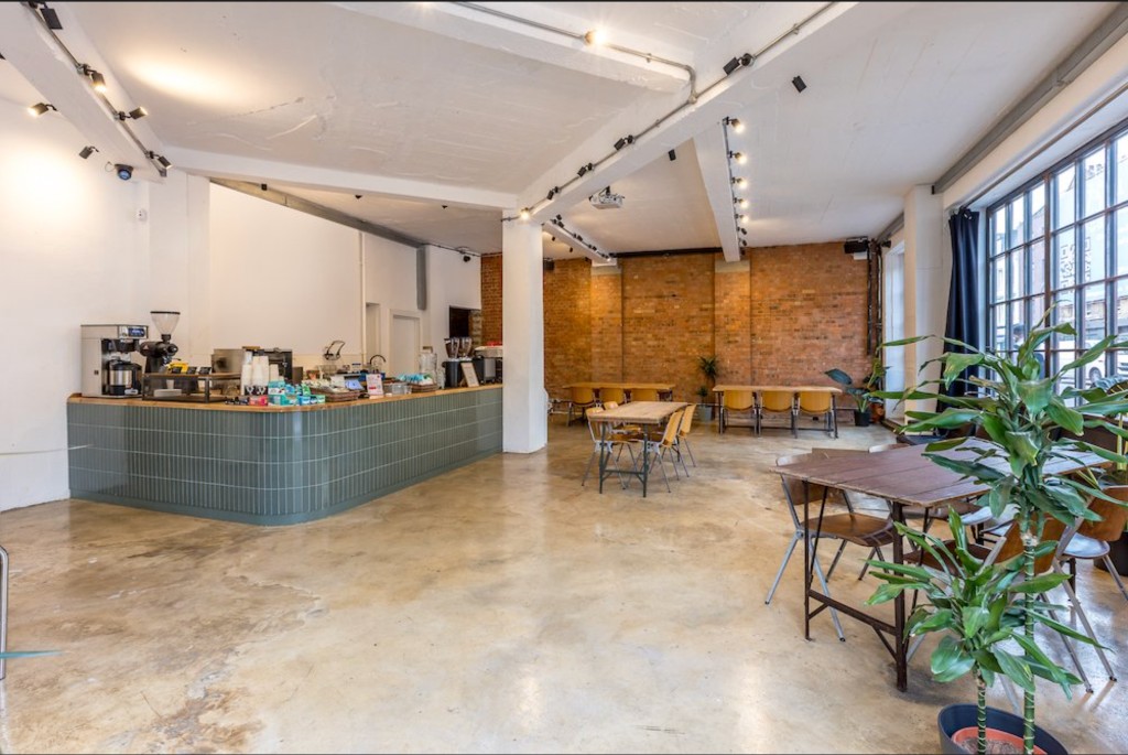Kachette Annex ground floor with sage-green bar and exposed brick